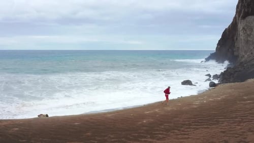 Aerial View of the Sportsman Exercising in Picturesque Coastal Area