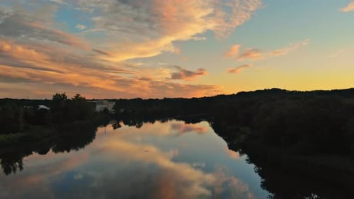 A Beautiful View By the River in Forest During Sunset in Sammer Evening