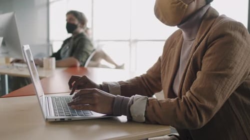 Women Working in Office Wearing Protective Masks