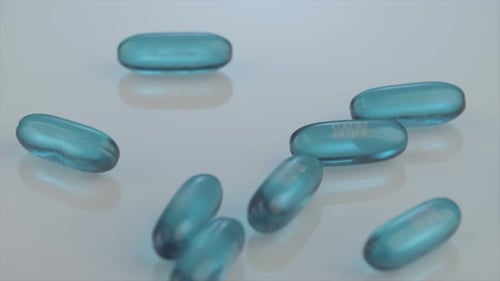 Blue Gel Capsules Falling