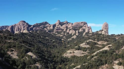 Aerial flight trough mountains of Montserrat, Spain
