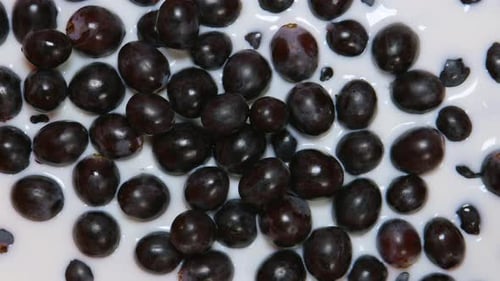 Grapes Covered in White Liquid