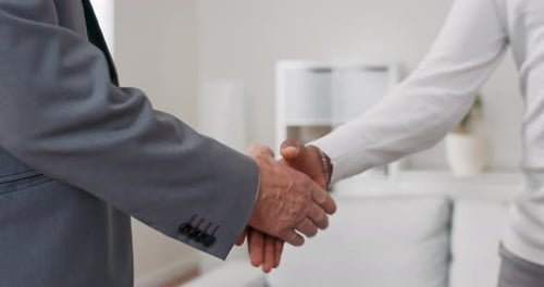 Men Handshake Indoors During Business Meeting