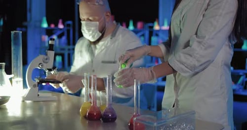 Scientists Conducting Research in a Futuristic Lab