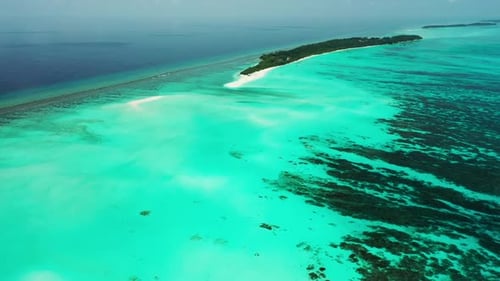 Aerial drone scenery of idyllic tourist beach holiday by aqua blue ocean with white sand background