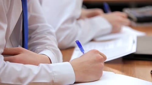 High School Teenage Students at the Desk
