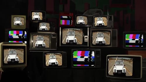 Old Vintage Car and Vintage TVs.