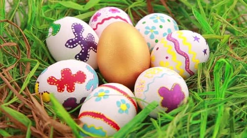 Colorful Decorated Easter Eggs in Green Grass