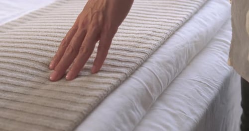 Woman Hand By Hotel Bed