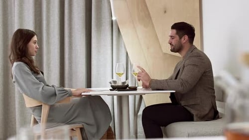 Happy Couple Celebrating Anniversary in Restaurant