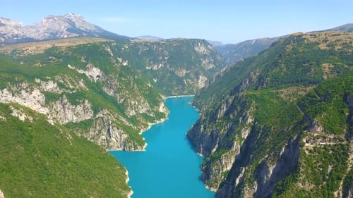 Aerial View of Lake Piva with Turquoise Water and Mountains in National Park Durmitor Montenegro