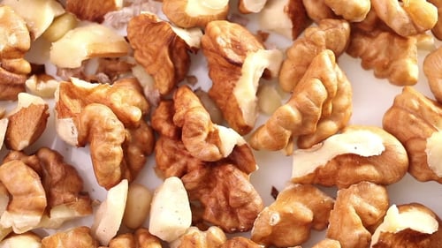 Close Up of Raw Walnuts Panning Shot