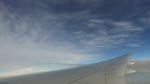 Wing Of Airplane Flying In Blue Sky 16