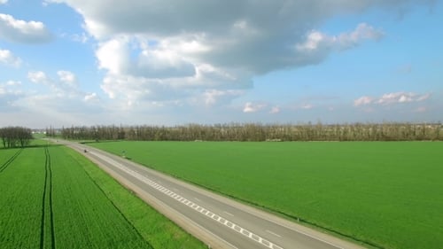 Aerial View Flight Above Cars Driving On Country Road