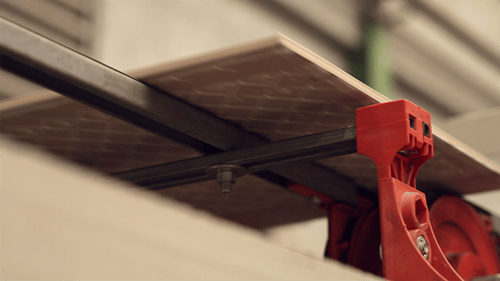 Tiles moving along factory conveyor belt