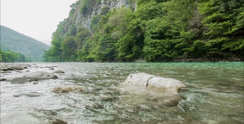 Mountain River And Stones