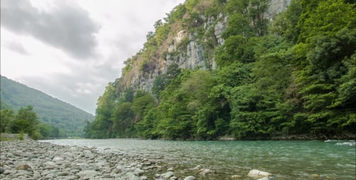 Mountain River With Stones And Grey Sky