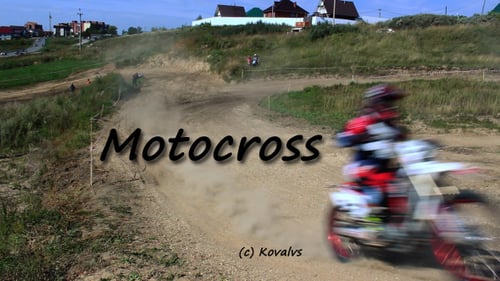 Motocross Racers Speeding on a Dirt Track