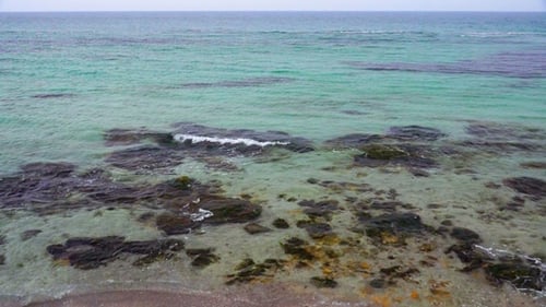 Small Sea Waves Breaking on the Stones