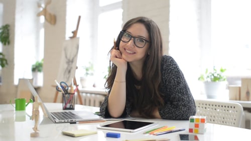 Smiling Female Designer Portrait, in Creative Office