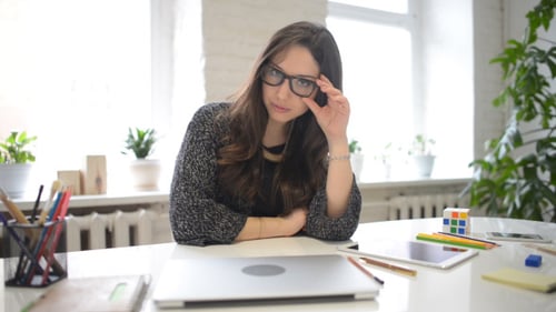 Smiling Female Designer in Her Creative Office