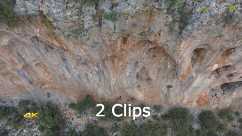 Aerial View of Rock Climbers on Cliff Face