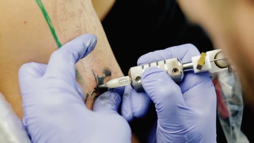 Creative Master Draws Tattoo On The Man's Shoulder