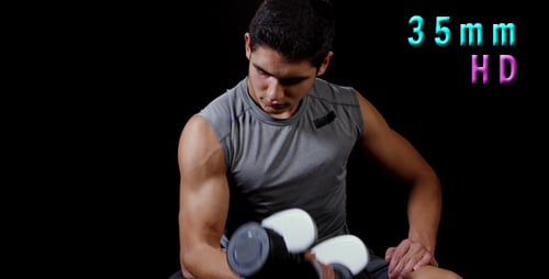 Young Man Strength Training Bicep Curls