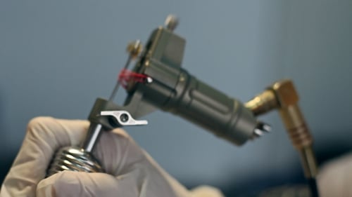 Tattoo Gun Close Up in Operation