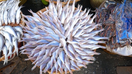 Dried Seafood Arranged in Woven Baskets