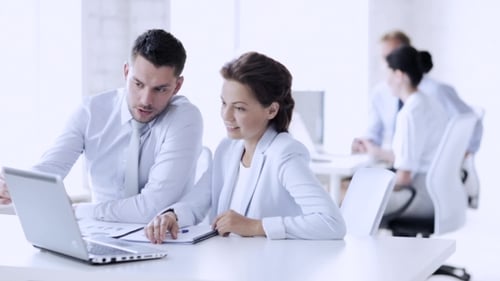 Businesspeople With Laptop Meeting At Office 68