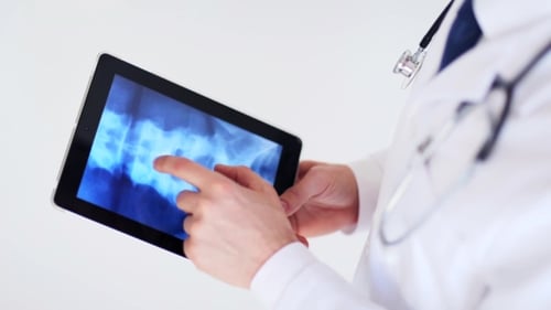 Doctor With X-ray Scan On Tablet Pc 34