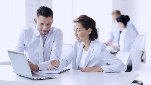 Businesspeople With Laptop Meeting At Office 71