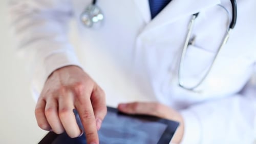Doctor With X-ray Scan On Tablet Pc 33
