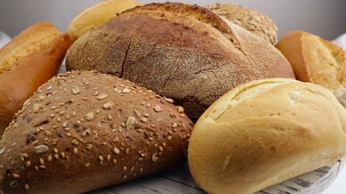 Bread In The Rotating Basket On a Table