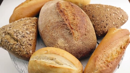 Bread In The Rotating Basket On a Table