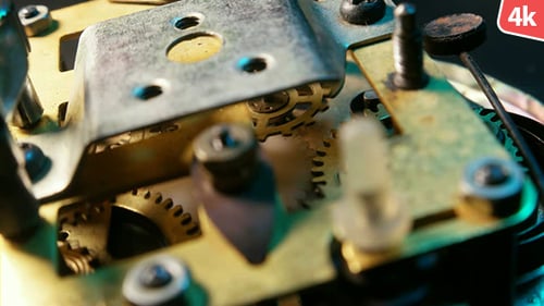 Clock Gears Turning in a Macro Shot