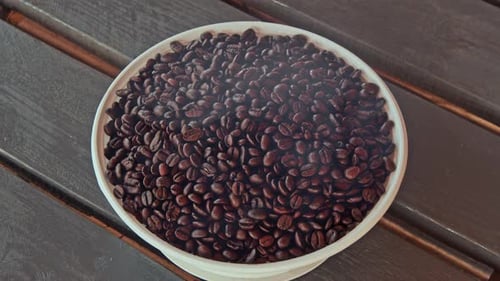 Bowl full of coffee beans on a table