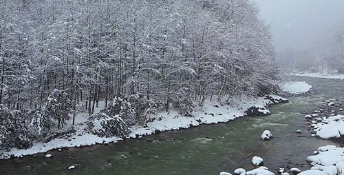 Snowfall On The River