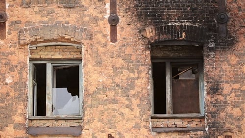 Building with Broken Windows and Fire Damage