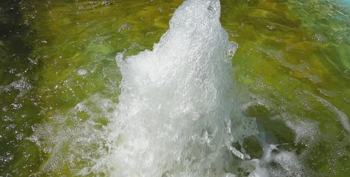 Water Fountain in a Pool in Park
