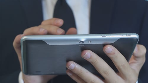 Man Using Tablet
