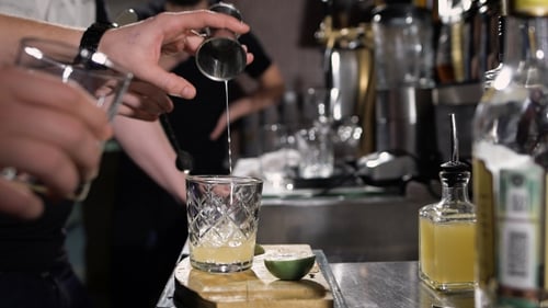 Bartender Makes Cocktail at the Bar