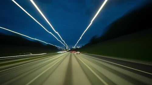 Driving on the night highway, time-lapse