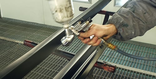 Robotic Arm Painting Automobile Parts in Factory