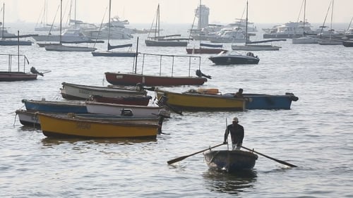 Tourist And Fisher Boats By The Harbour
