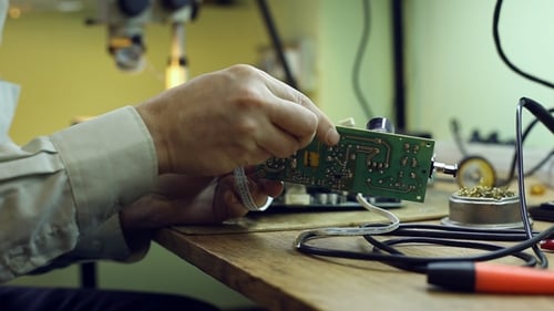 Scientist in laboratory Parses the Device