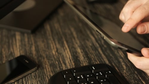 Tablet At Wooden Desk