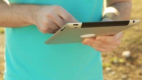 Man Using Tablet Outdoor