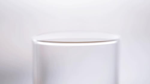Milk Pouring Into Glass On Wooden Table 59